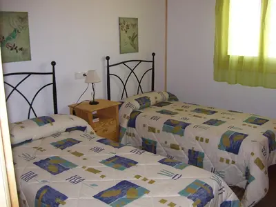 Cama o camas de una habitación en Vivienda de uso turístico Fuente Vilda VT-LR 0033