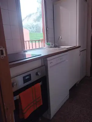 Una cocina o zona de cocina en Apartamentos calatorao con jardín y 3 habitaciones