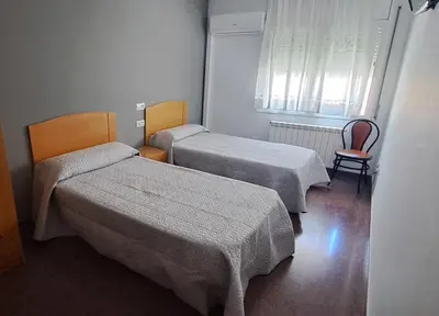 Cama o camas de una habitación en Hostal Casa Casado