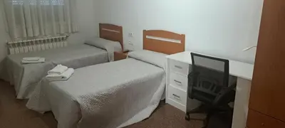 Cama o camas de una habitación en Hostal Casa Casado