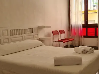 Cama o camas de una habitación en Antiga Fonda la Palma