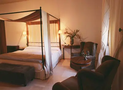 Cama o camas de una habitación en Hospedería del Monasterio de Rueda
