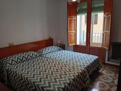 Cama o camas de una habitación en central apartment in Caspe