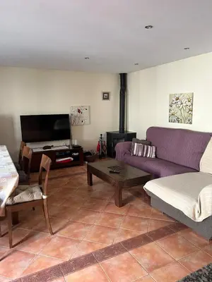 Una televisión o centro de entretenimiento en Casa Rural Barranco
