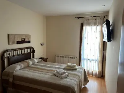 Cama o camas de una habitación en Casa Rural Barranco