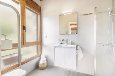 Un baño de Cova Cuberes