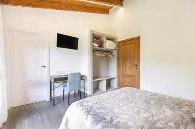 Cama o camas de una habitación en Cova Cuberes