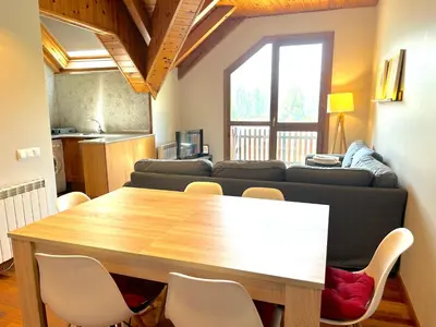 Zona de estar de Apartament rústic amb encant i balcó by RURAL D'ÀNEU