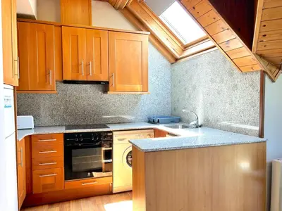 Una cocina o zona de cocina en Apartament rústic amb encant i balcó by RURAL D'ÀNEU