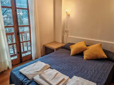 Cama o camas de una habitación en Confort en la Vall de Boí - Sol y buena ubicación - Cuc 5