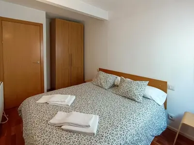 Cama o camas de una habitación en InmoCyma Benasque El Refugio de Maladeta