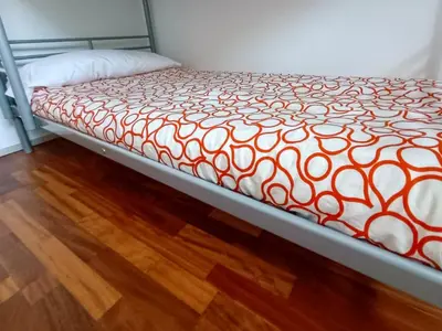 Cama o camas de una habitación en InmoCyma Benasque El Refugio de Maladeta
