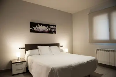 Cama o camas de una habitación en WinTuWin Apartments