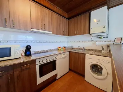 Una cocina o zona de cocina en Stone, wifi, pet-friendly y garage - Arafita Apartamentos