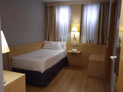 Cama o camas de una habitación en U Hotel Villa-Gomá