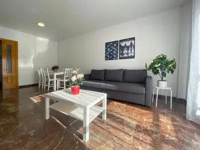 Zona de estar de Apartamentos Zaragoza Suites El Pilar 3000