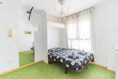 Cama o camas de una habitación en Stylish Duplex in the heart of Zaragoza