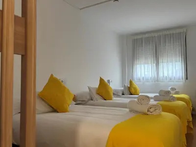 Cama o camas de una habitación en Hostal Batallar