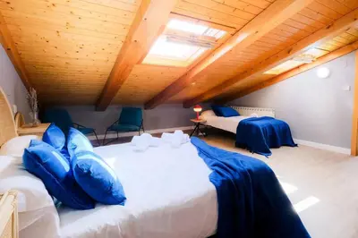Cama o camas de una habitación en Ático Alfonso | Amplio Céntrico Renovado | 10 Pax