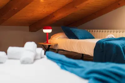 Cama o camas de una habitación en Ático Alfonso | Amplio Céntrico Renovado | 10 Pax