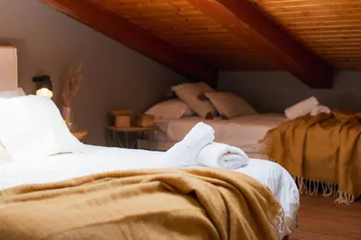 Cama o camas de una habitación en Ático Alfonso | Amplio Céntrico Renovado | 10 Pax