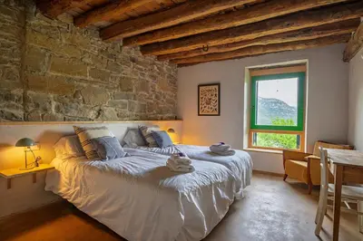 Cama o camas de una habitación en Borda Viñuels
