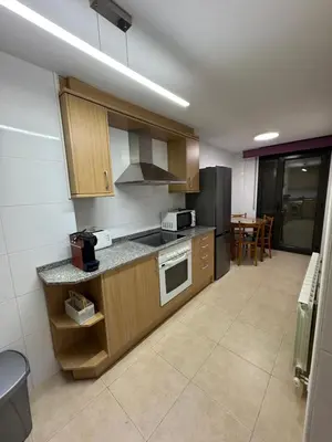 Una cocina o zona de cocina en El teu habitatge a Tremp