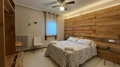 Cama o camas de una habitación en Hostal Ochoa