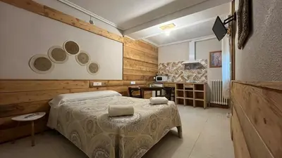 Cama o camas de una habitación en Hostal Ochoa