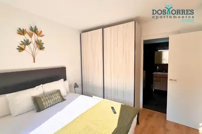 Cama o camas de una habitación en Dos Torres La Dulcería - Jacuzzi y vistas en el corazón de Zaragoza