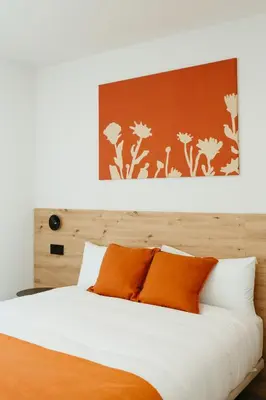Cama o camas de una habitación en Hostal Ainhoa