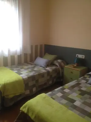 Cama o camas de una habitación en Apartaments El Ribal