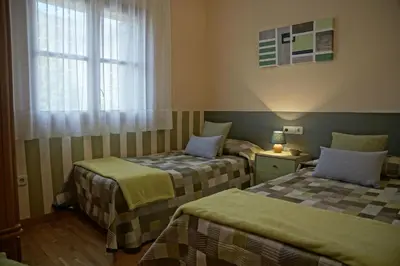 Cama o camas de una habitación en Apartaments El Ribal