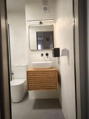 Un baño de Apartamentos Crispin Samantha
