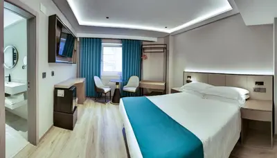 Cama o camas de una habitación en Hotel Calagurris