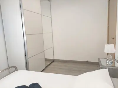 Cama o camas de una habitación en El Rincón de San Fermín