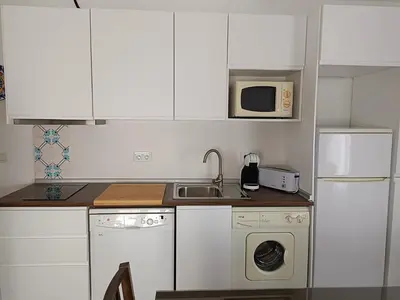 Una cocina o zona de cocina en El Rincón de San Fermín