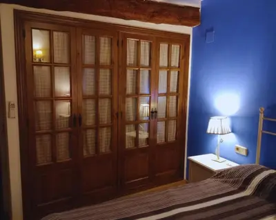 Cama o camas de una habitación en Piso a orillas del río