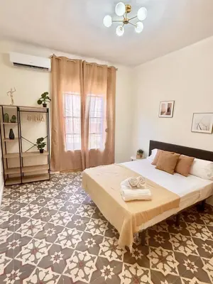 Cama o camas de una habitación en Piso Reformado con Historia en cada Rincon-Vive Zaragoza XIV