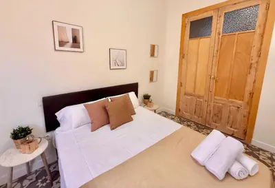 Cama o camas de una habitación en Piso Reformado con Historia en cada Rincon-Vive Zaragoza XIV