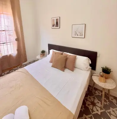 Cama o camas de una habitación en Piso Reformado con Historia en cada Rincon-Vive Zaragoza XIV