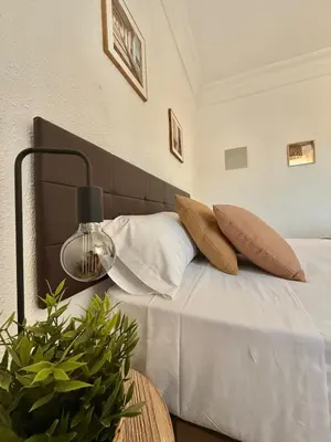 Cama o camas de una habitación en Tu Refugio en Zaragoza - Vive Zaragoza IX