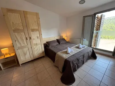 Cama o camas de una habitación en Somianatura - Casa Rural Capafonts