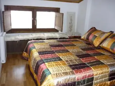 Cama o camas de una habitación en Apartamento Isona en Pirineo