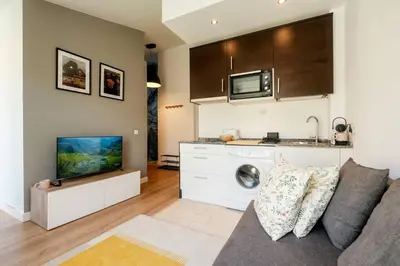 Una cocina o zona de cocina en Atico Ordesa Barbacoa Terraza WiFi 4 Pax Ascensor