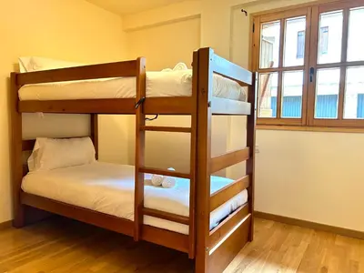 Cama o camas de una habitación en Apartament de muntanya i lluminós by RURAL D'ÀNEU