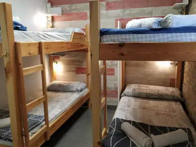 Cama o camas de una habitación en Alojamientos Acá y Allá