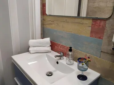Un baño de Alojamientos Acá y Allá
