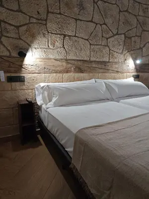 Cama o camas de una habitación en Torre Belvedere