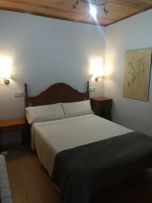 Cama o camas de una habitación en Apartamento con jardin en Gessa